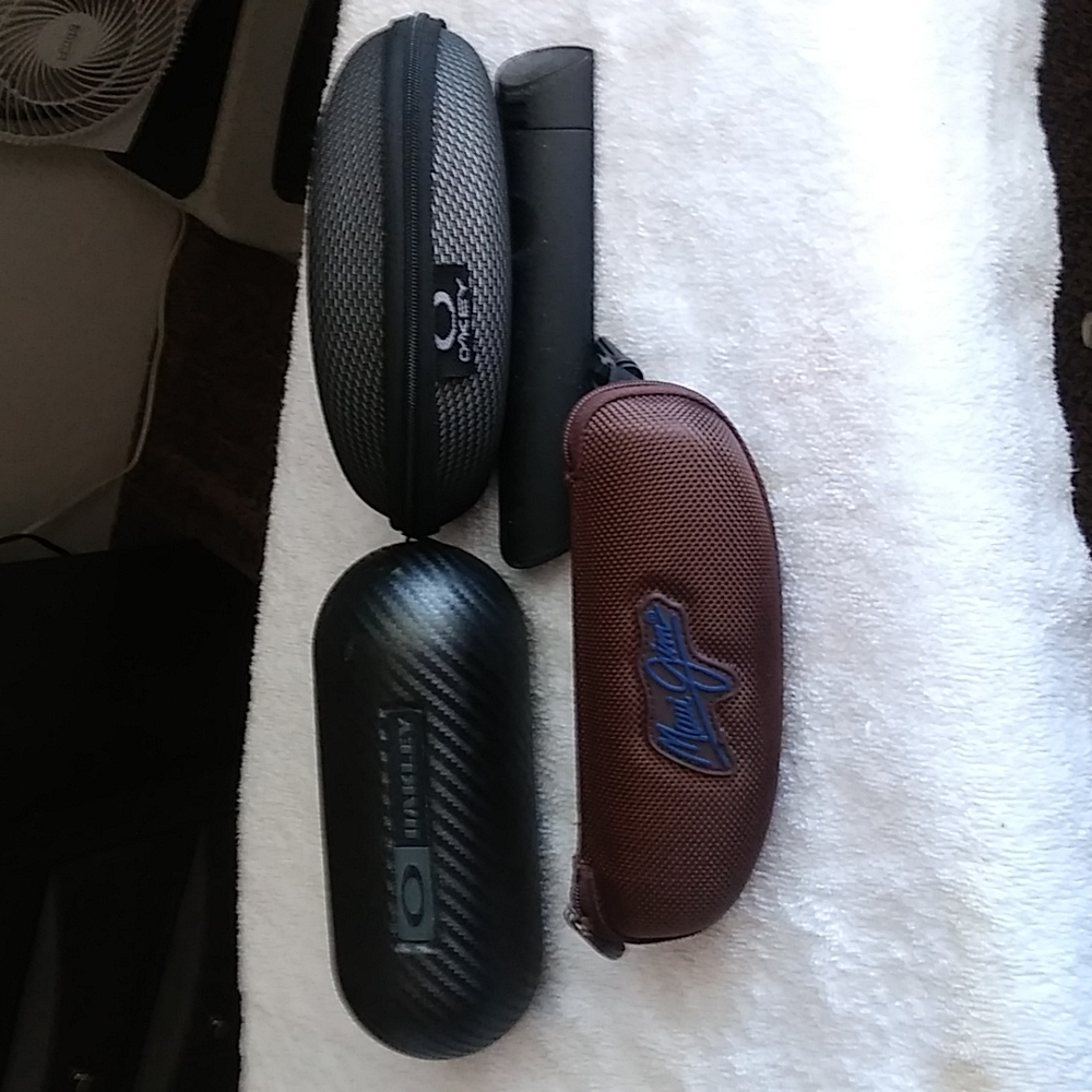 Three sunglass glass cases ..New never been used.